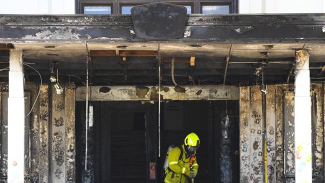 Fire damage at the front steps of Old Parliament House.