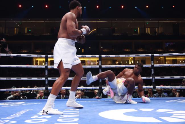 Anthony Joshua sends Francis Ngannou to the floor.