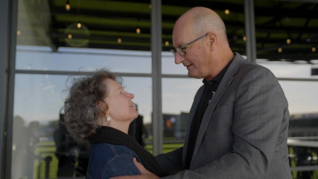 David Koch and Allison, a victim of a celebrity scam, at the Port Adelaide ground. 