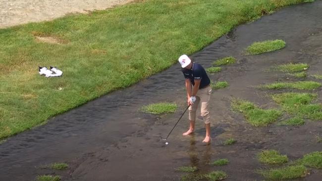 Cam Smith saved par with a great shot out of the water.