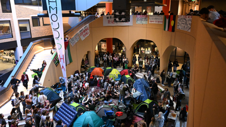 Pro-Palestine protesters have spent the night locked in a University of Melbourne hall, leading to a second day of cancelled classes.